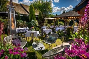 La Popote Secret Garden, Freshly Laid Tables Adorned With Flowers